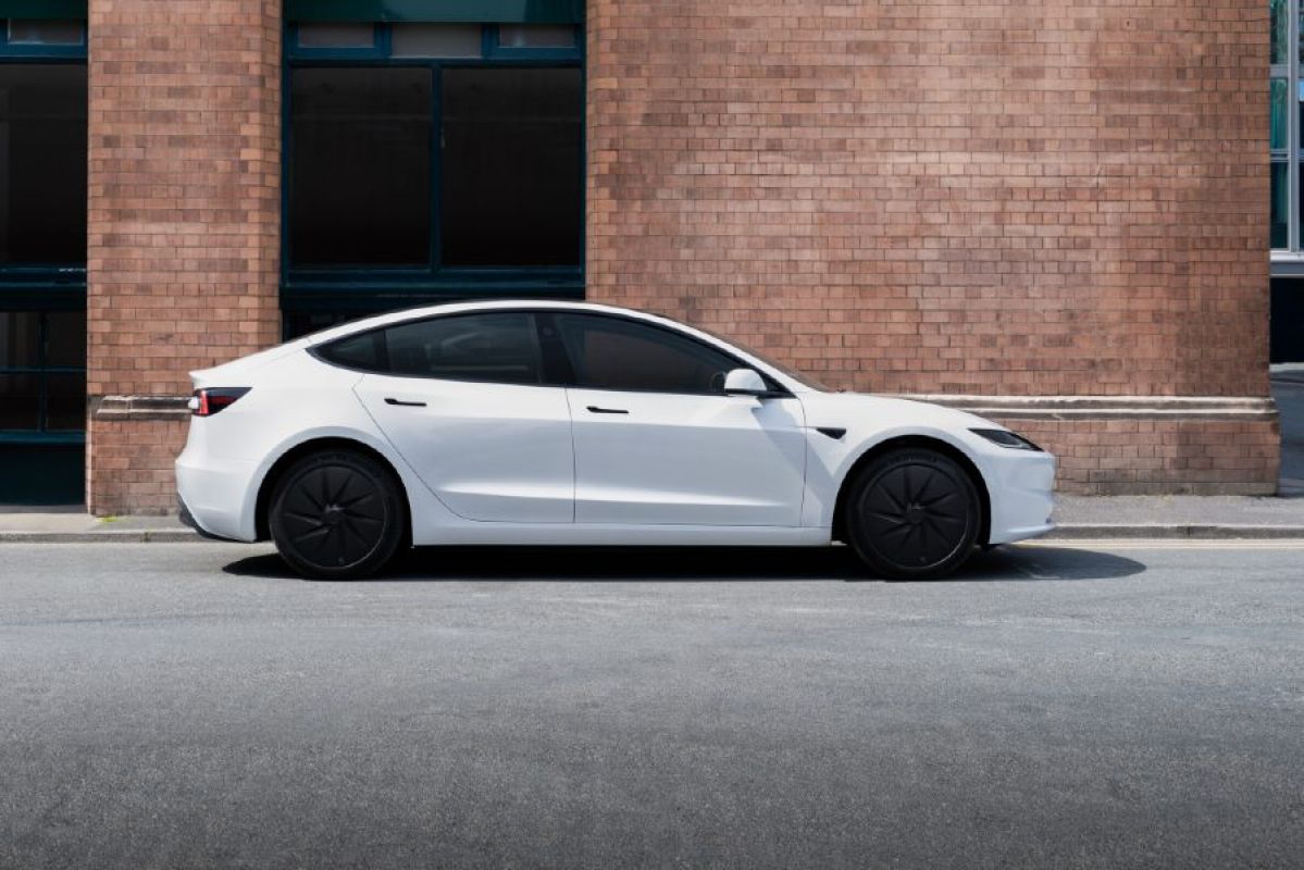 white 2026 Tesla Model 3 parked outside